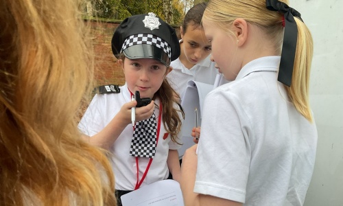 Year 6 children undertaking their Police Academy training.