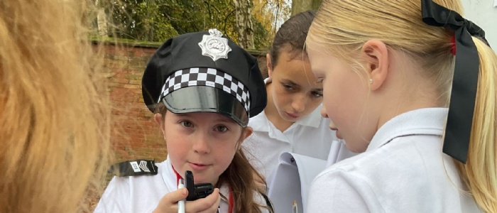Year 6 children undertaking their Police Academy training.